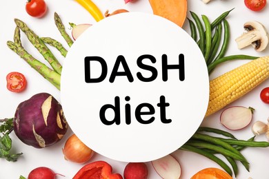 Image of Balanced food for DASH diet to stop hypertension. Assortment of fresh vegetable on white table, flat lay