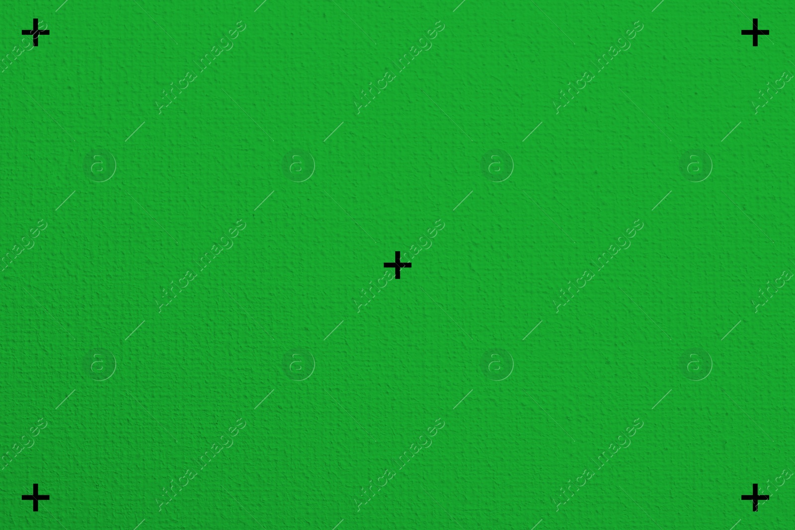 Image of Textured bright green background. Chroma key compositing