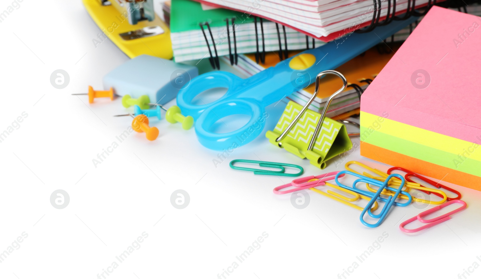 Photo of Different colorful stationery on white background. Back to school