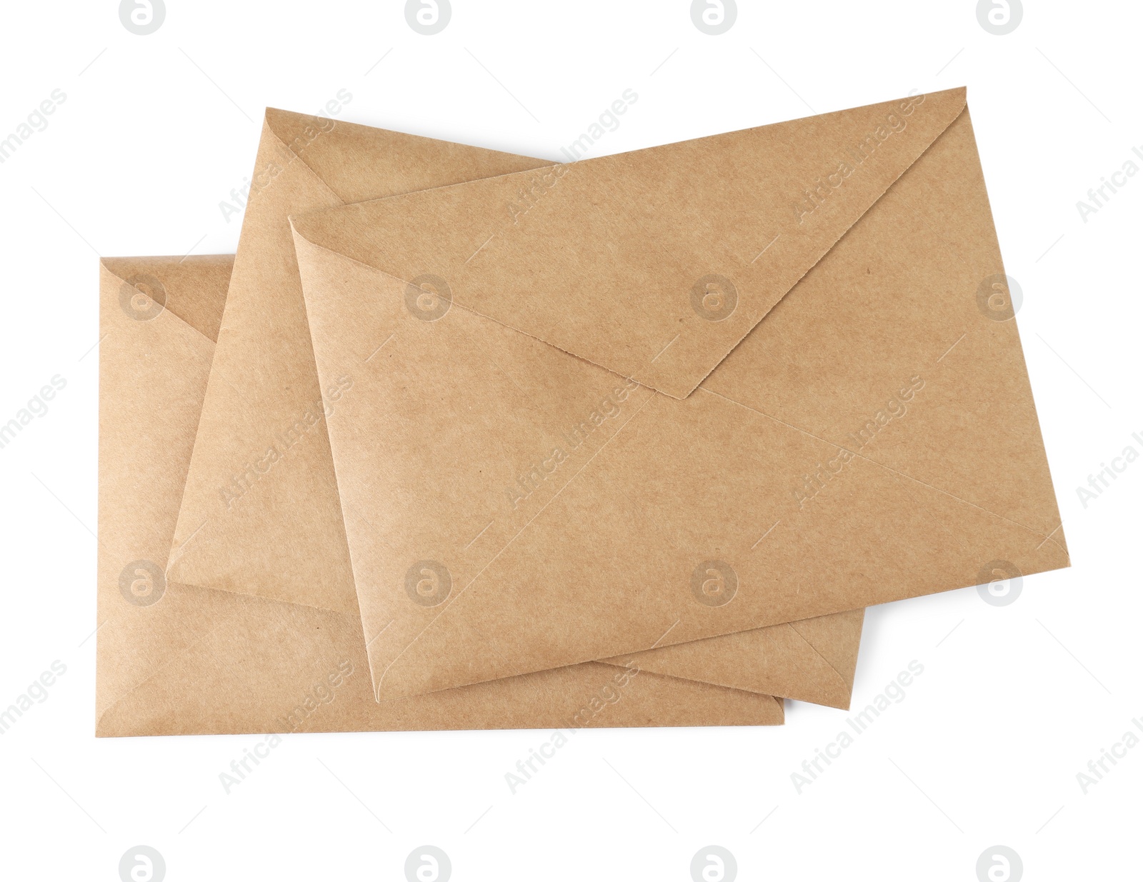 Photo of Stack of brown letters on white background, top view