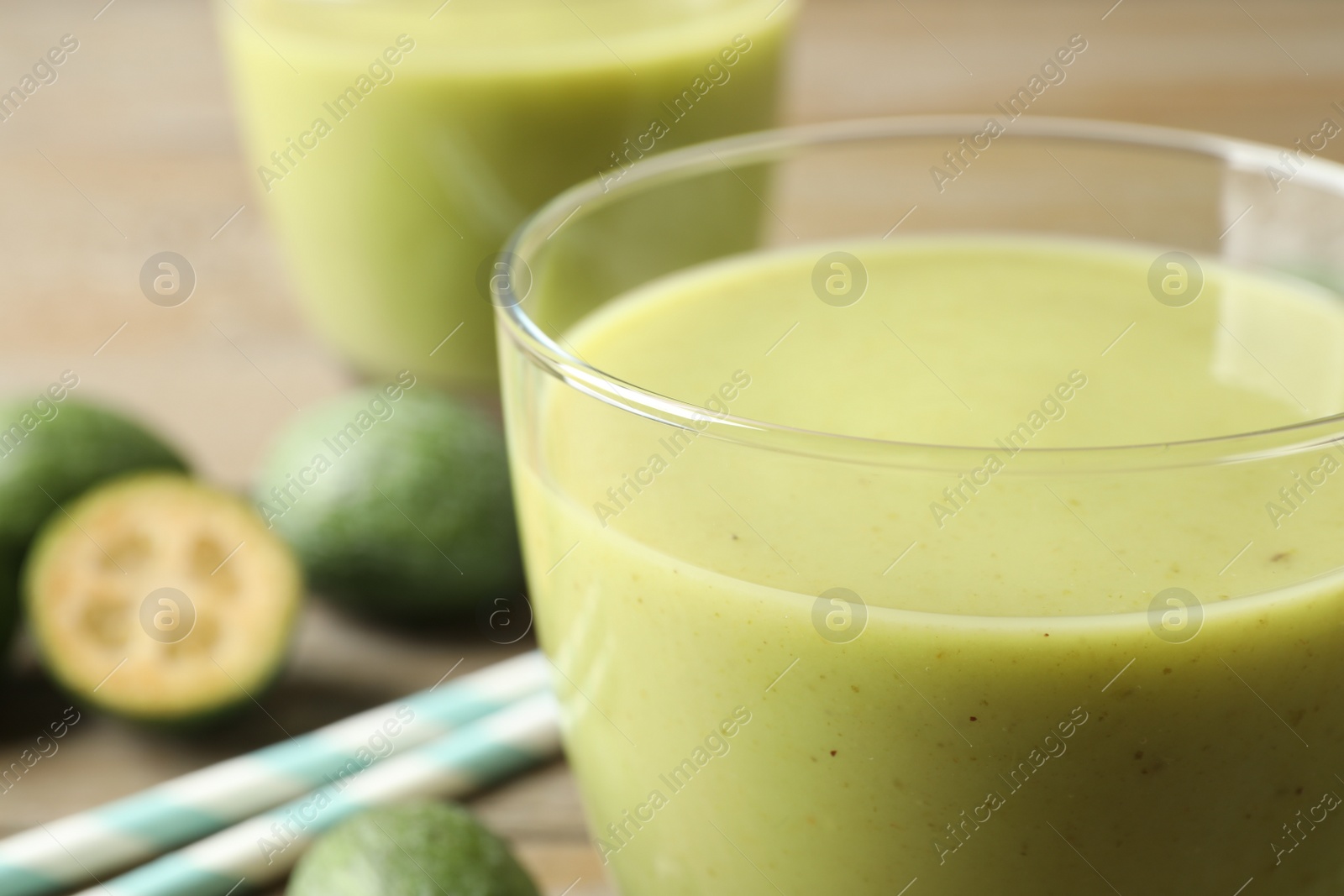 Photo of Freshly made feijoa smoothie on table, closeup