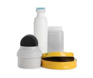 Set of shoe care products on white background