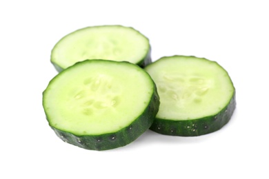 Photo of Slices of fresh cucumber on white background