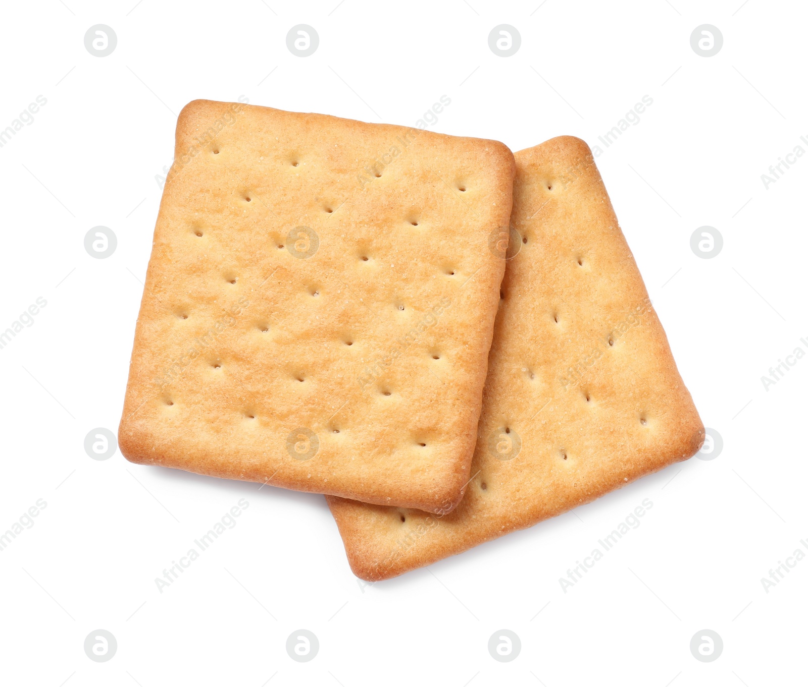 Photo of Two crispy crackers isolated on white, top view. Delicious snack