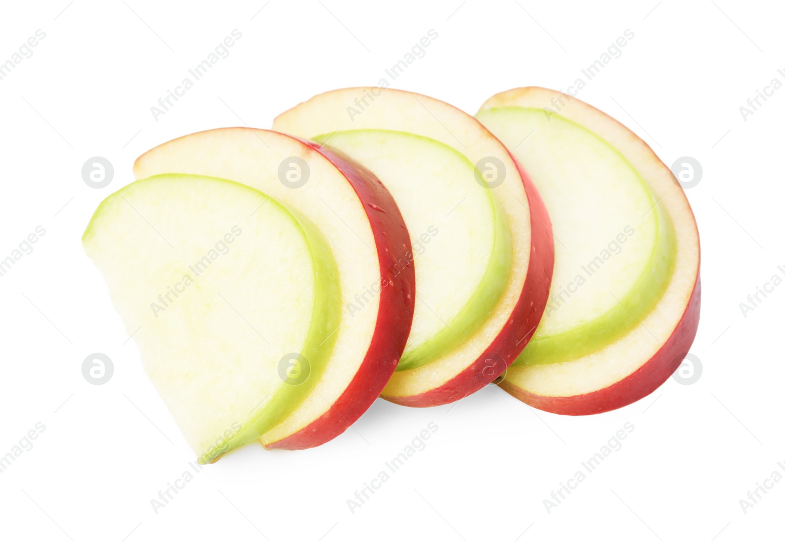 Photo of Slices of ripe apples isolated on white