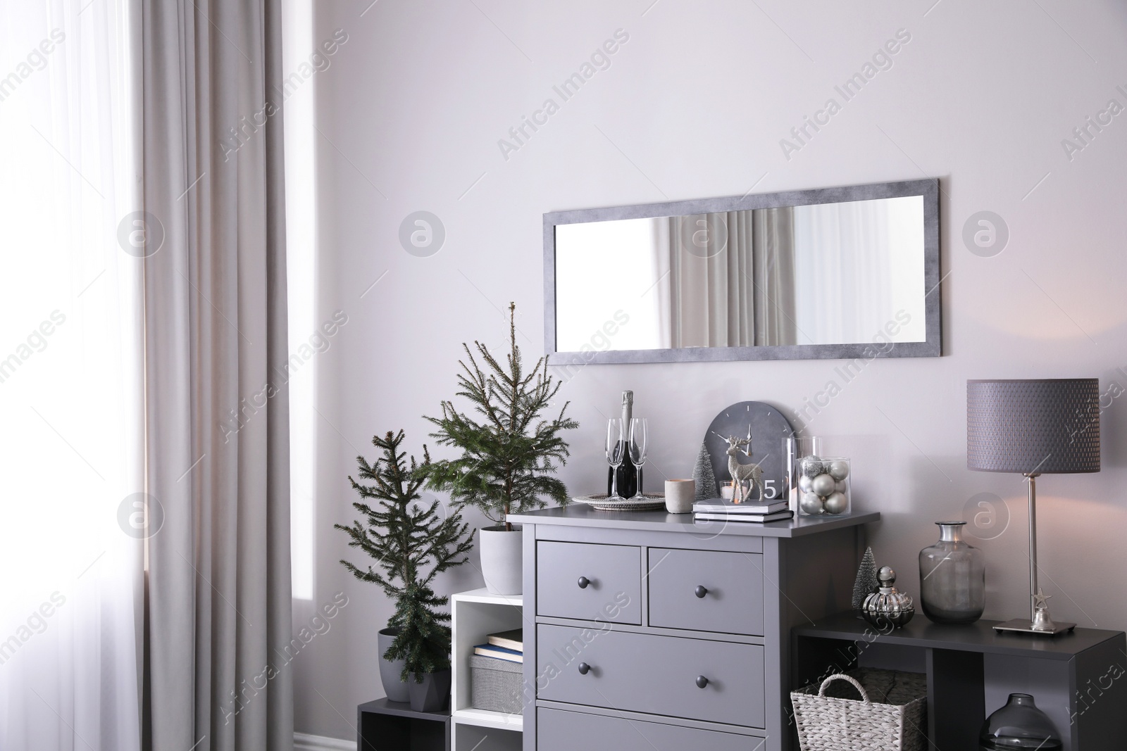 Photo of Beautiful room interior decorated for Christmas with potted firs