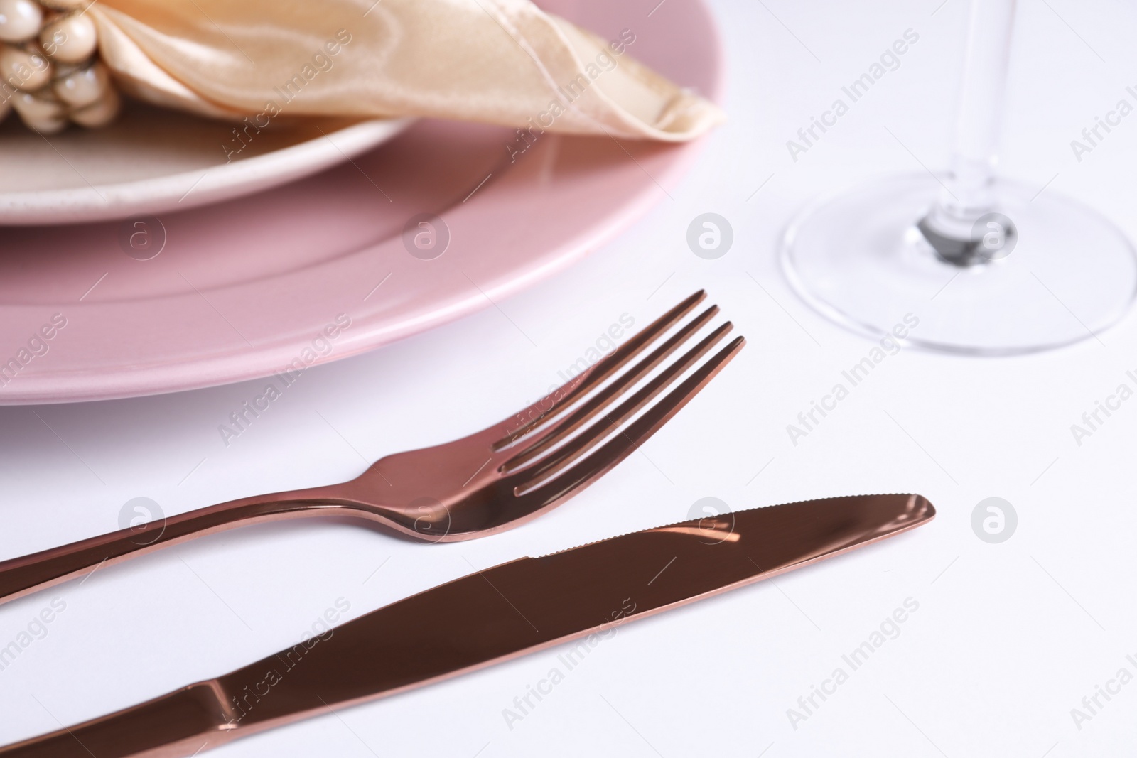 Photo of Beautiful table setting on white background, closeup