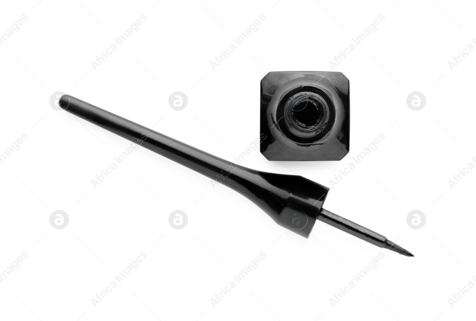 Photo of Black eyeliner isolated on white, top view. Makeup product