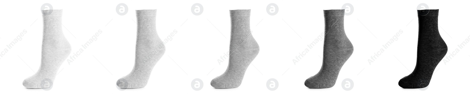 Image of Set with different socks on white background. Banner design