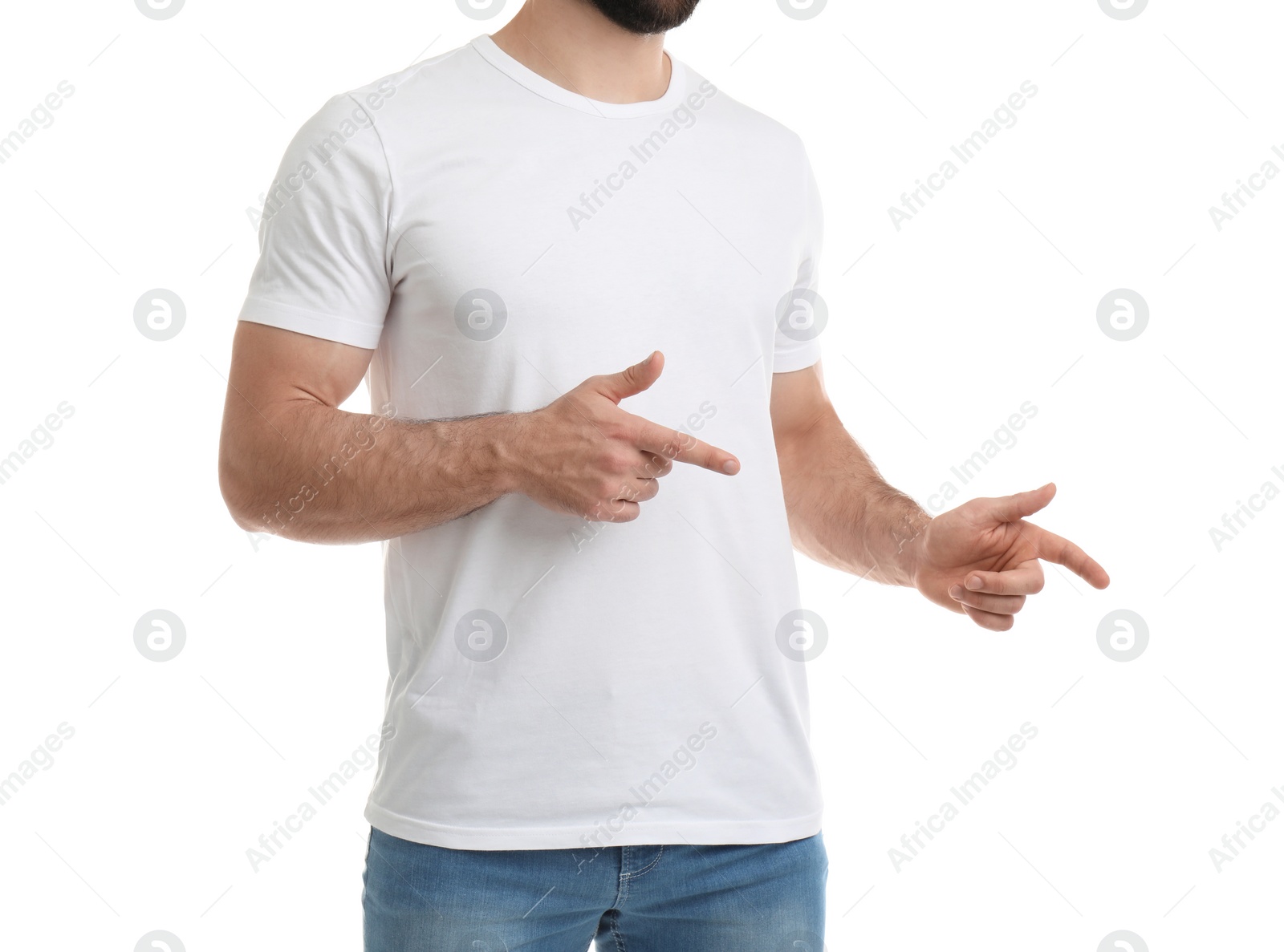 Photo of Young man in t-shirt on white background. Mockup for design