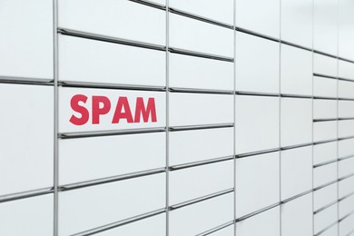 Image of Postal box with word Spam on parcel locker. Space for text