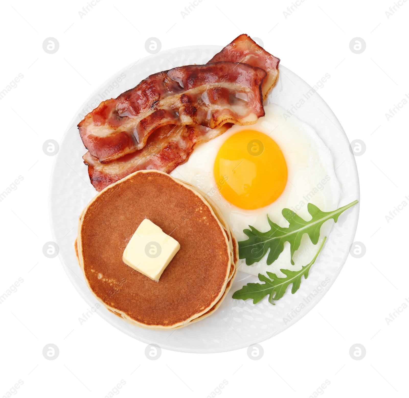 Photo of Tasty pancakes with fried egg and bacon isolated on white, top view