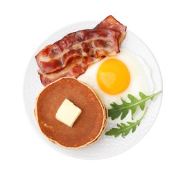 Tasty pancakes with fried egg and bacon isolated on white, top view