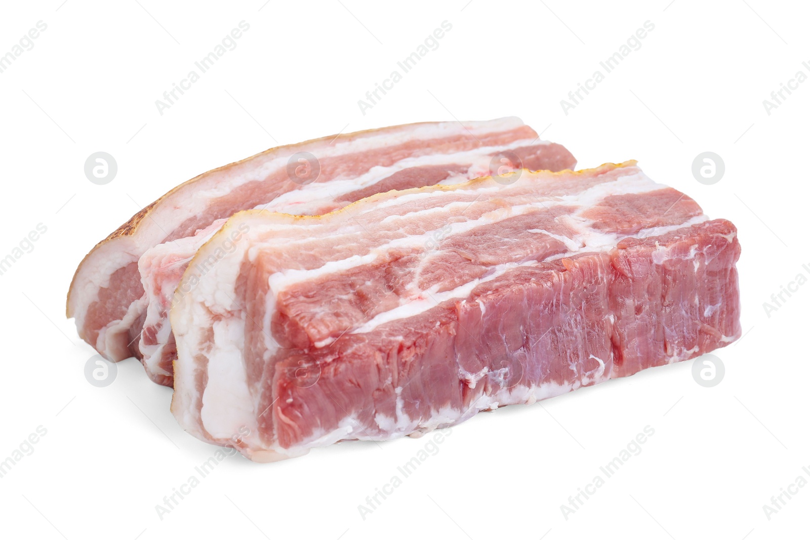 Photo of Pieces of raw pork belly isolated on white