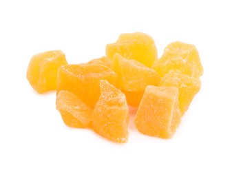 Photo of Delicious orange candied fruit pieces on white background
