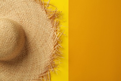Photo of Straw hat on color background, top view with space for text. Sun protection