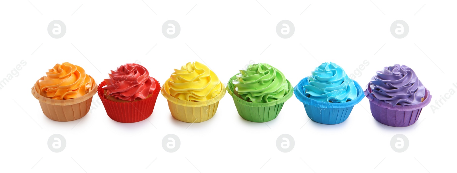 Photo of Tasty cupcakes with bright cream isolated on white