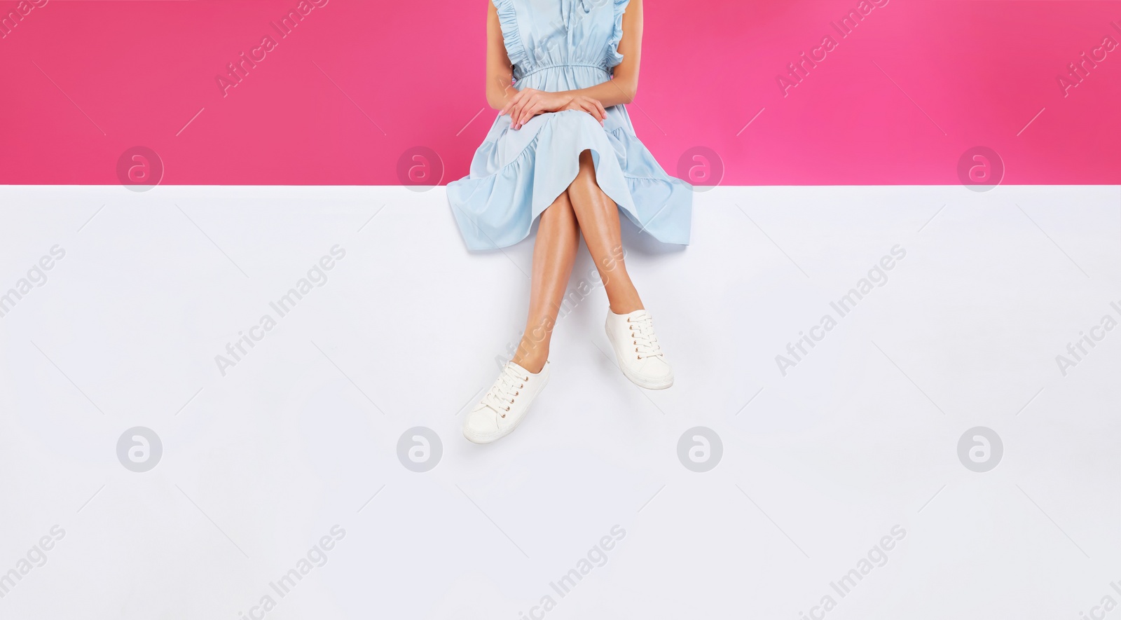 Photo of Woman wearing stylish shoes on color background, closeup