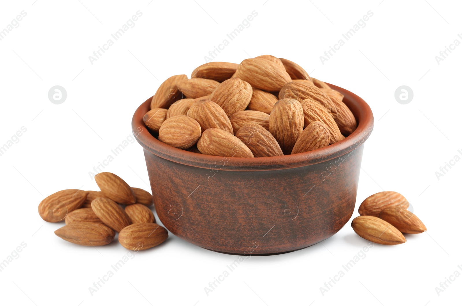 Photo of Bowl and organic almond nuts on white background. Healthy snack