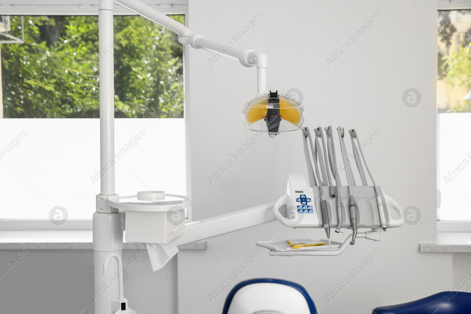 Photo of Set of professional equipment in dentist's office