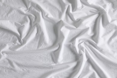 Crumpled white fabric as background, closeup view