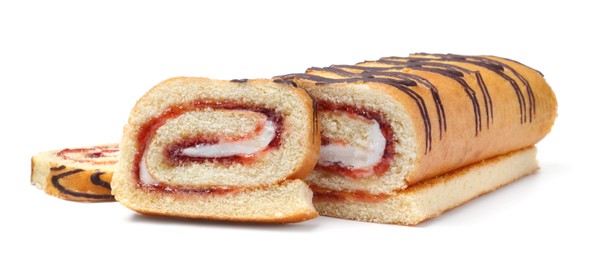 Tasty cake roll with cream and jam on white background