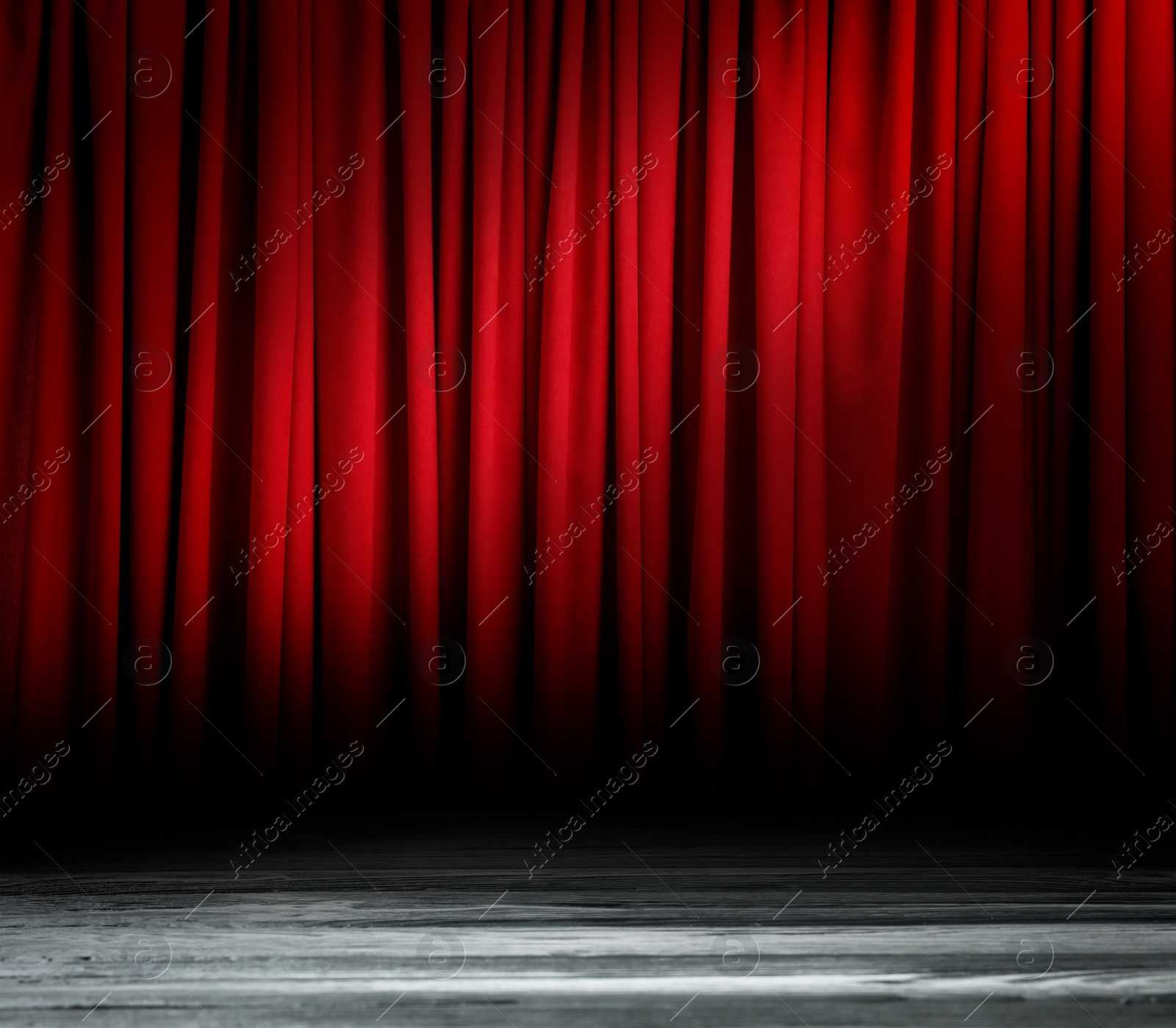 Image of Empty wooden stage and closed red curtains