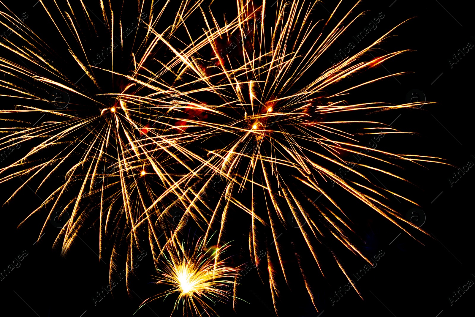 Image of Beautiful bright fireworks lighting up night sky