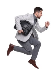 Photo of Handsome bearded businessman with briefcase on white background