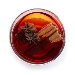 Photo of Glass of mulled wine with spices isolated on white, top view