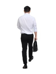 Photo of Businessman with briefcase walking on white background, back view