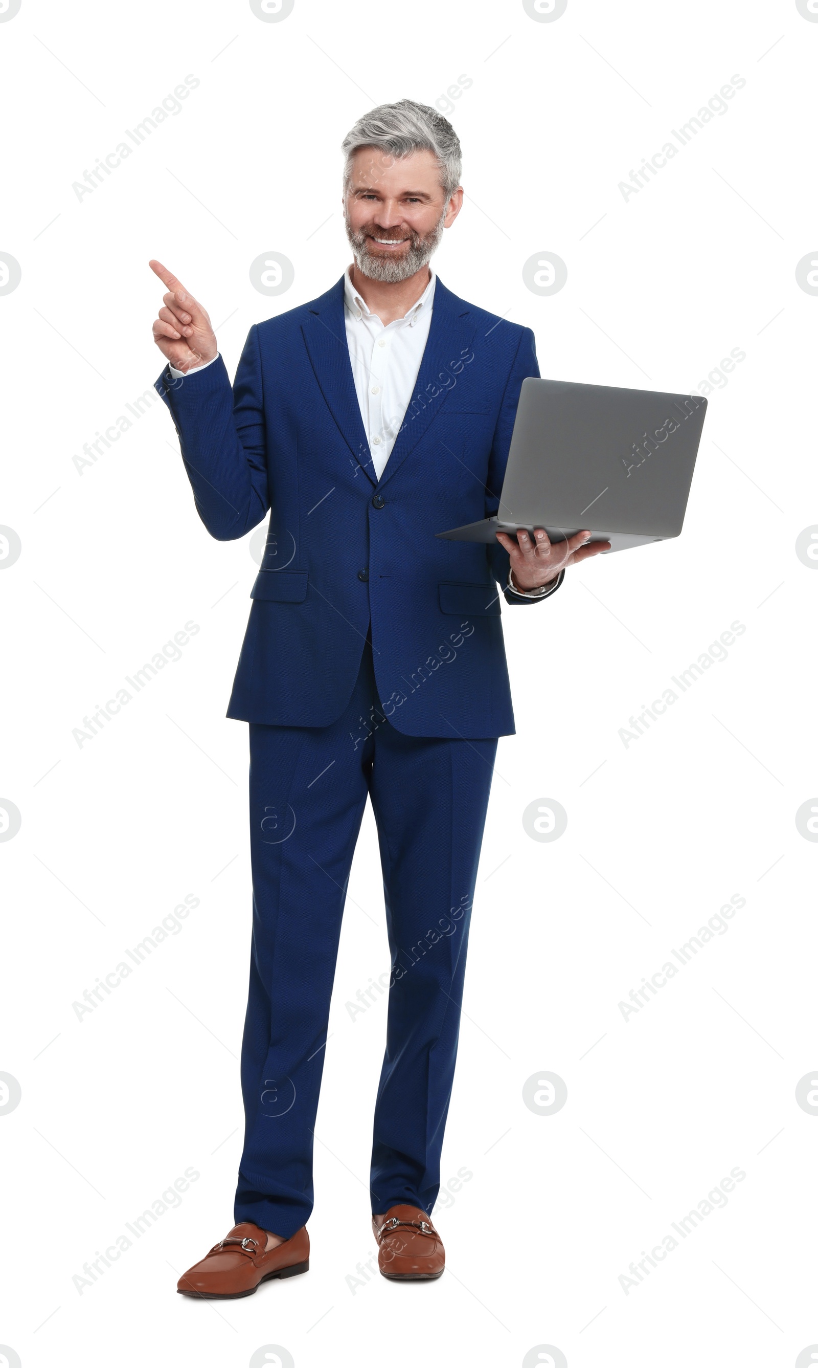 Photo of Mature businessman in stylish clothes with laptop on white background