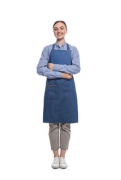 Beautiful young woman in clean denim apron on white background