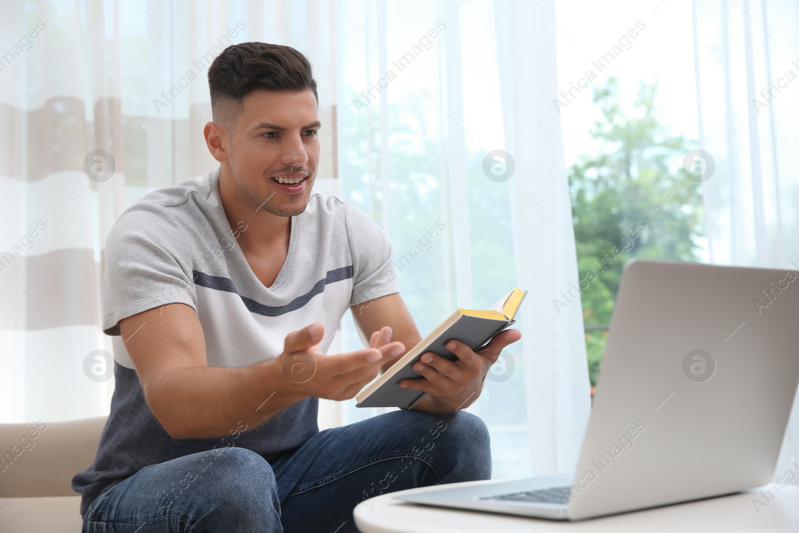 Photo of Teacher giving online lesson during quarantine. Studying at home