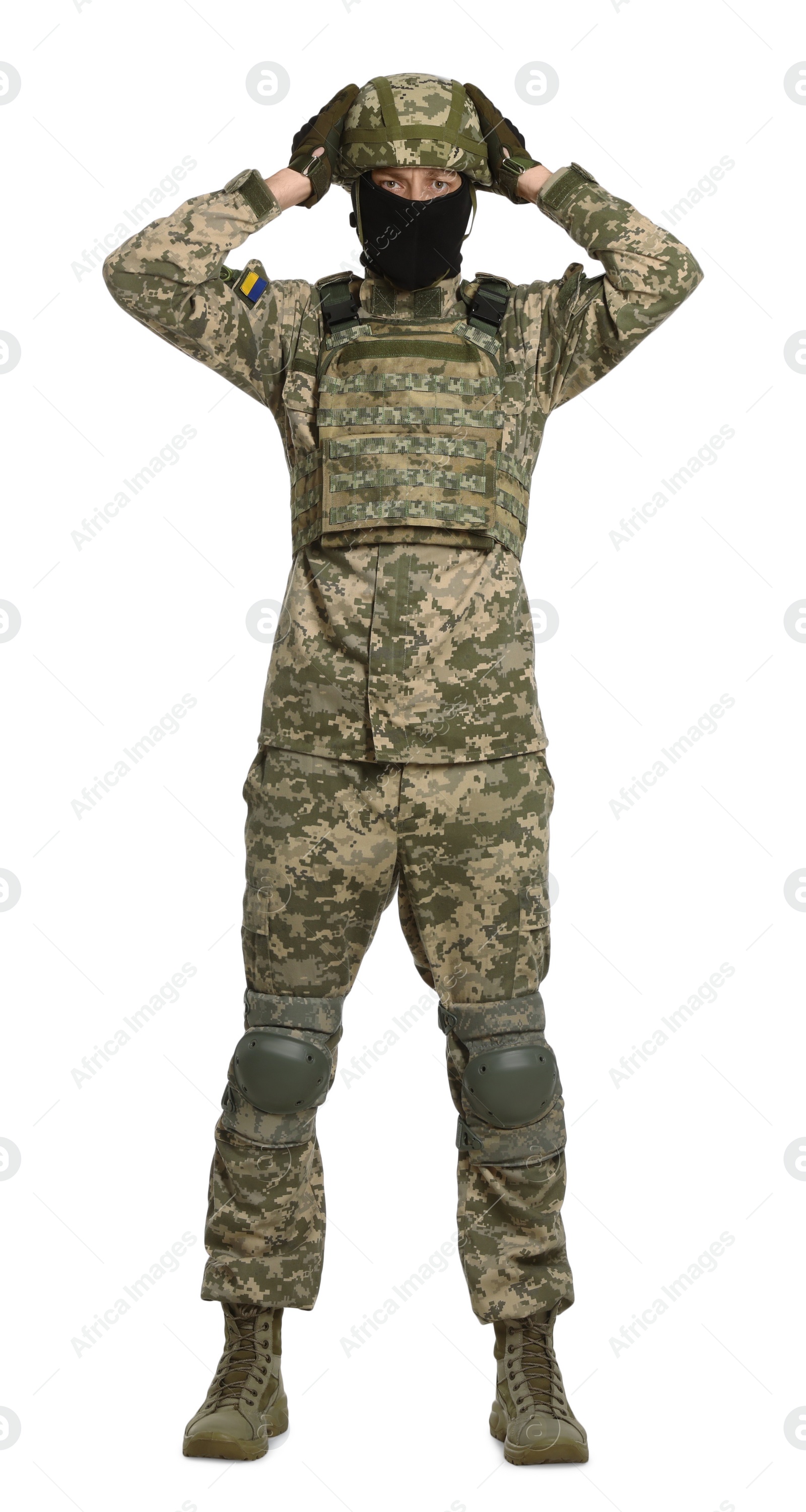 Photo of Ukrainian soldier in military uniform, helmet and balaclava on white background