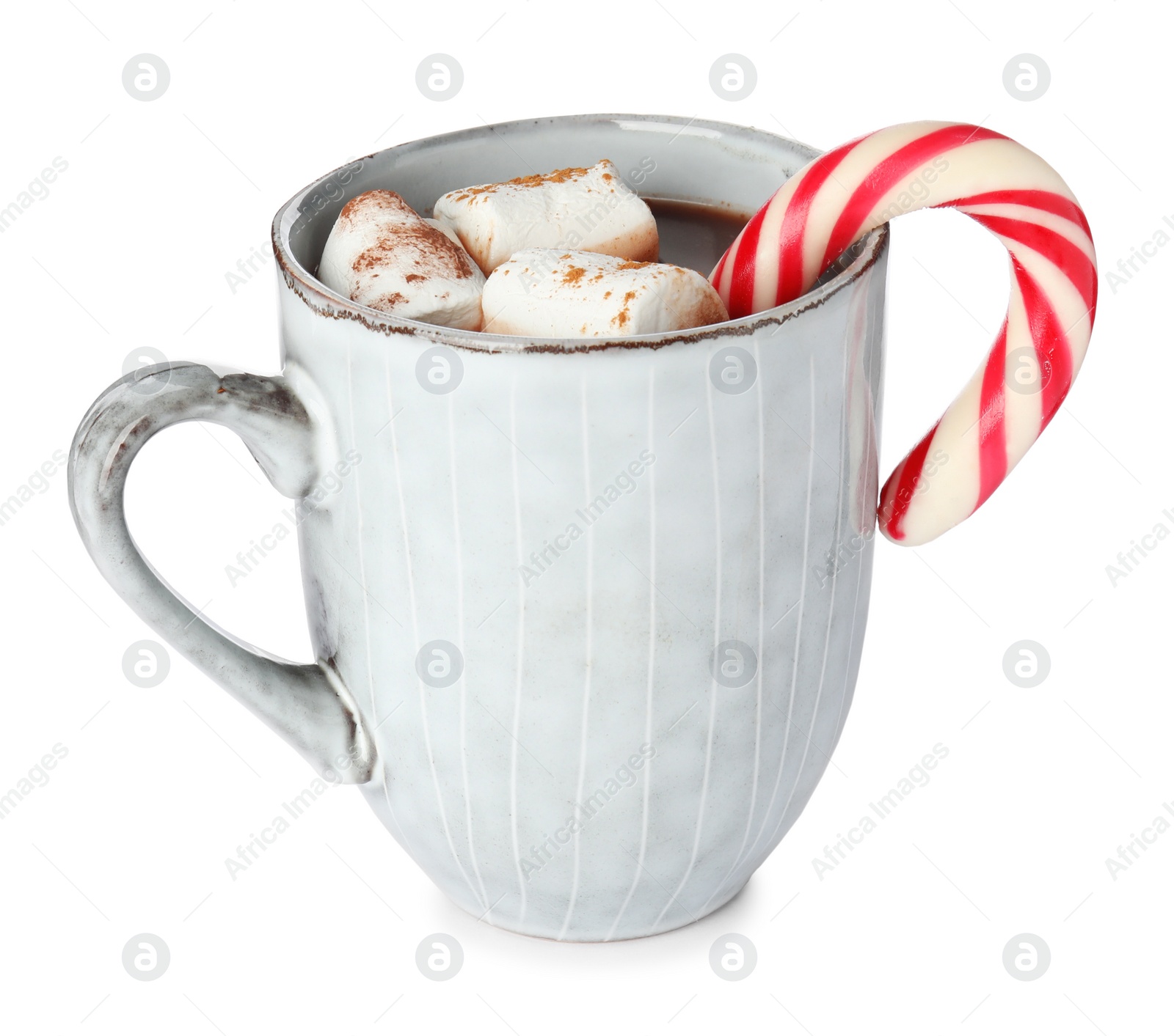 Photo of Cup of tasty cocoa with marshmallows and Christmas candy cane isolated on white