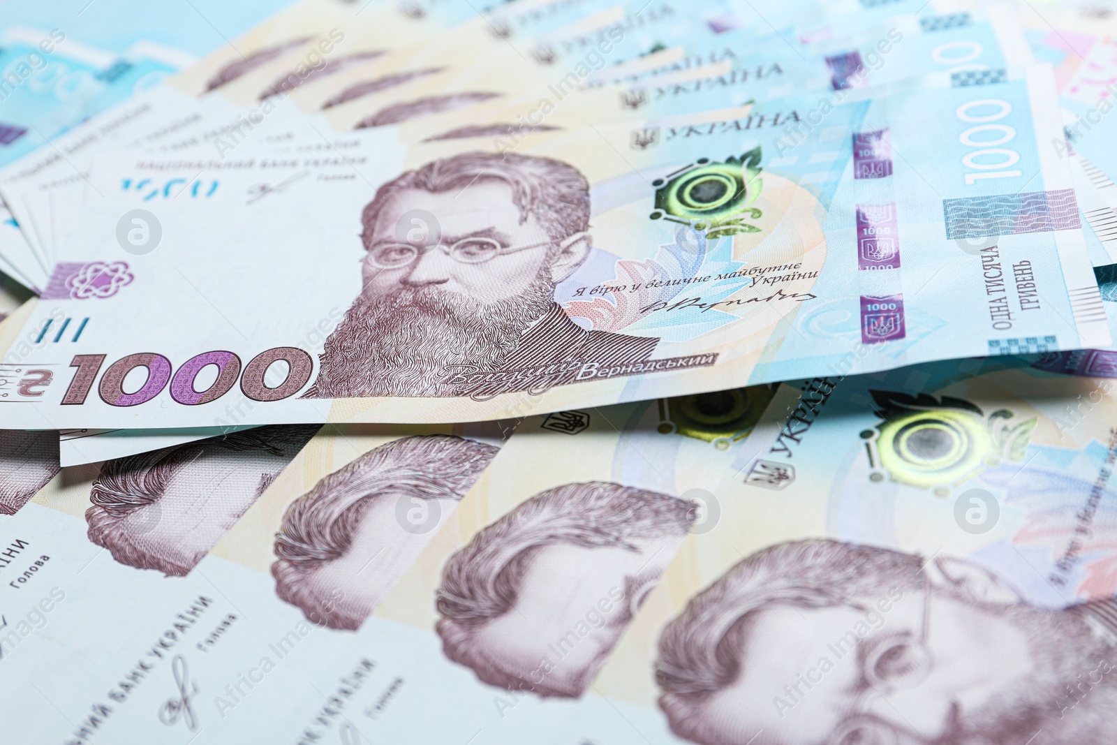 Photo of Closeup view of Ukrainian money as background. National currency