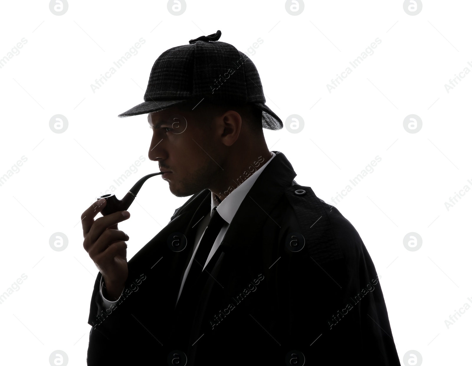 Photo of Old fashioned detective with smoking pipe on white background