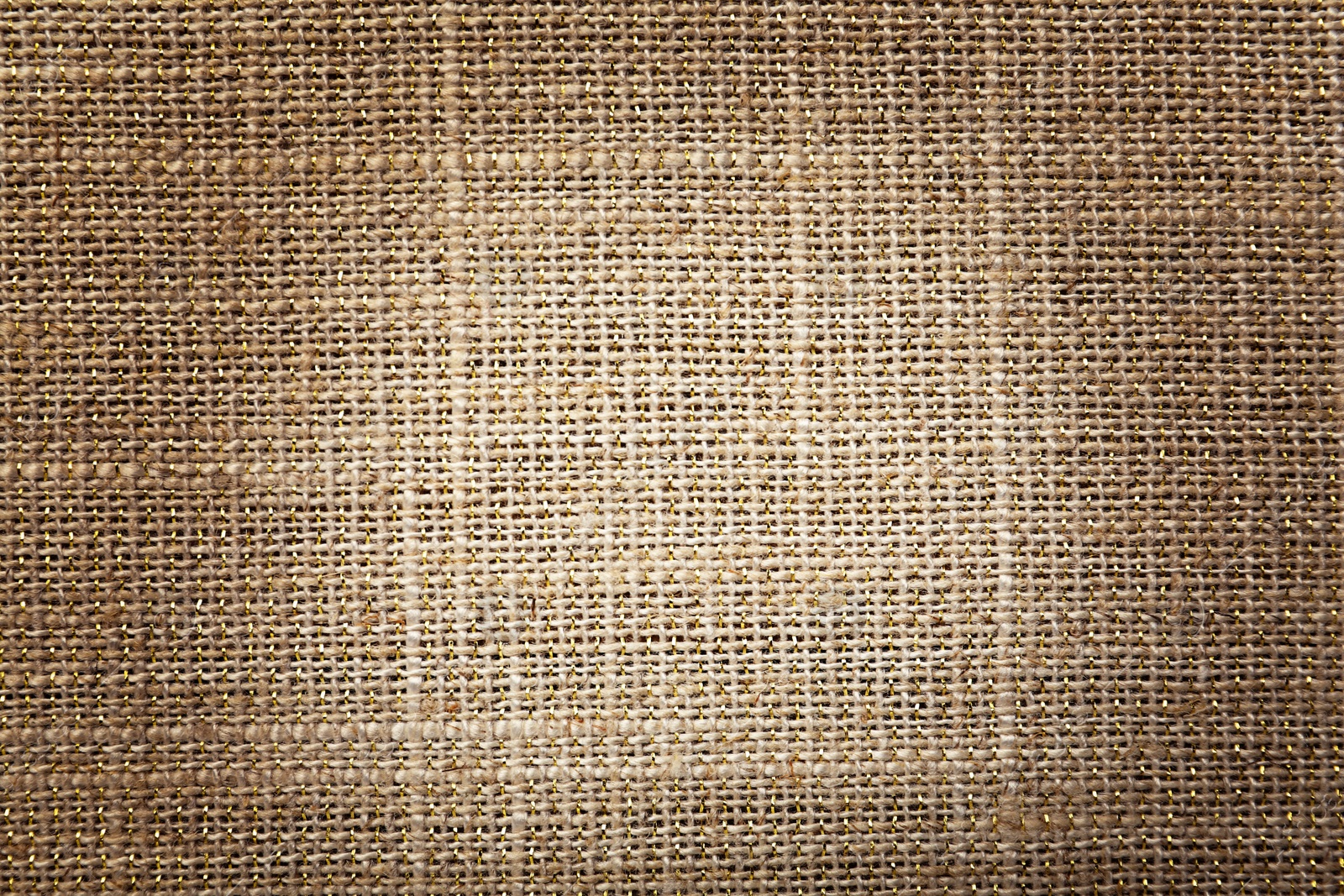 Image of Texture of natural burlap fabric as background, top view. Vignette effect 