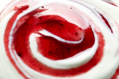 Tasty yoghurt with jam as background, closeup