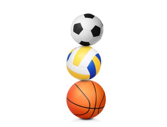 Image of Stack of different sport balls on white background