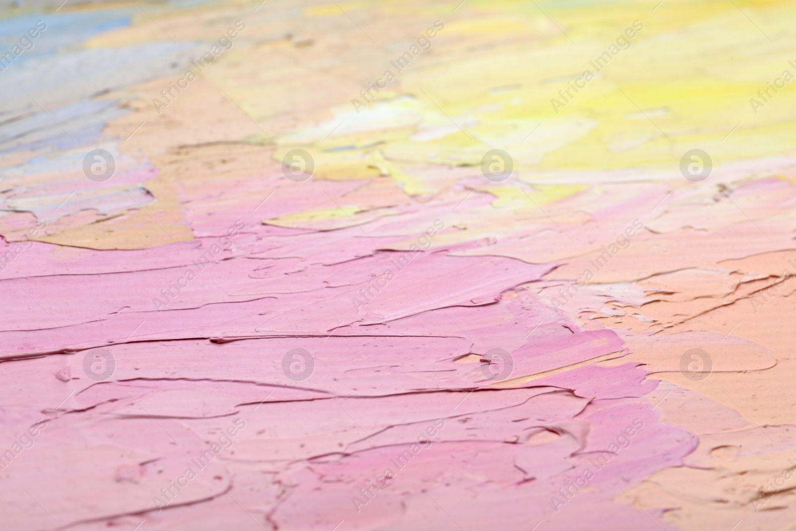 Photo of Beautiful strokes of pastel oil paints as background, closeup