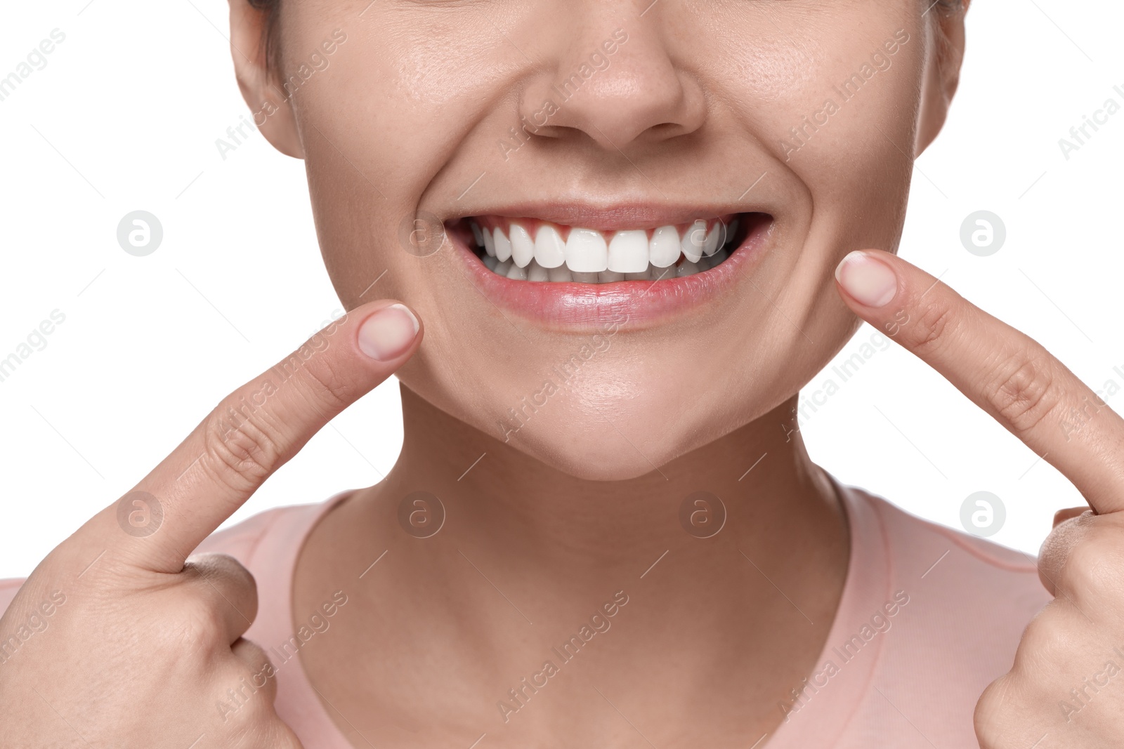 Photo of Woman showing healthy gums on white background, closeup