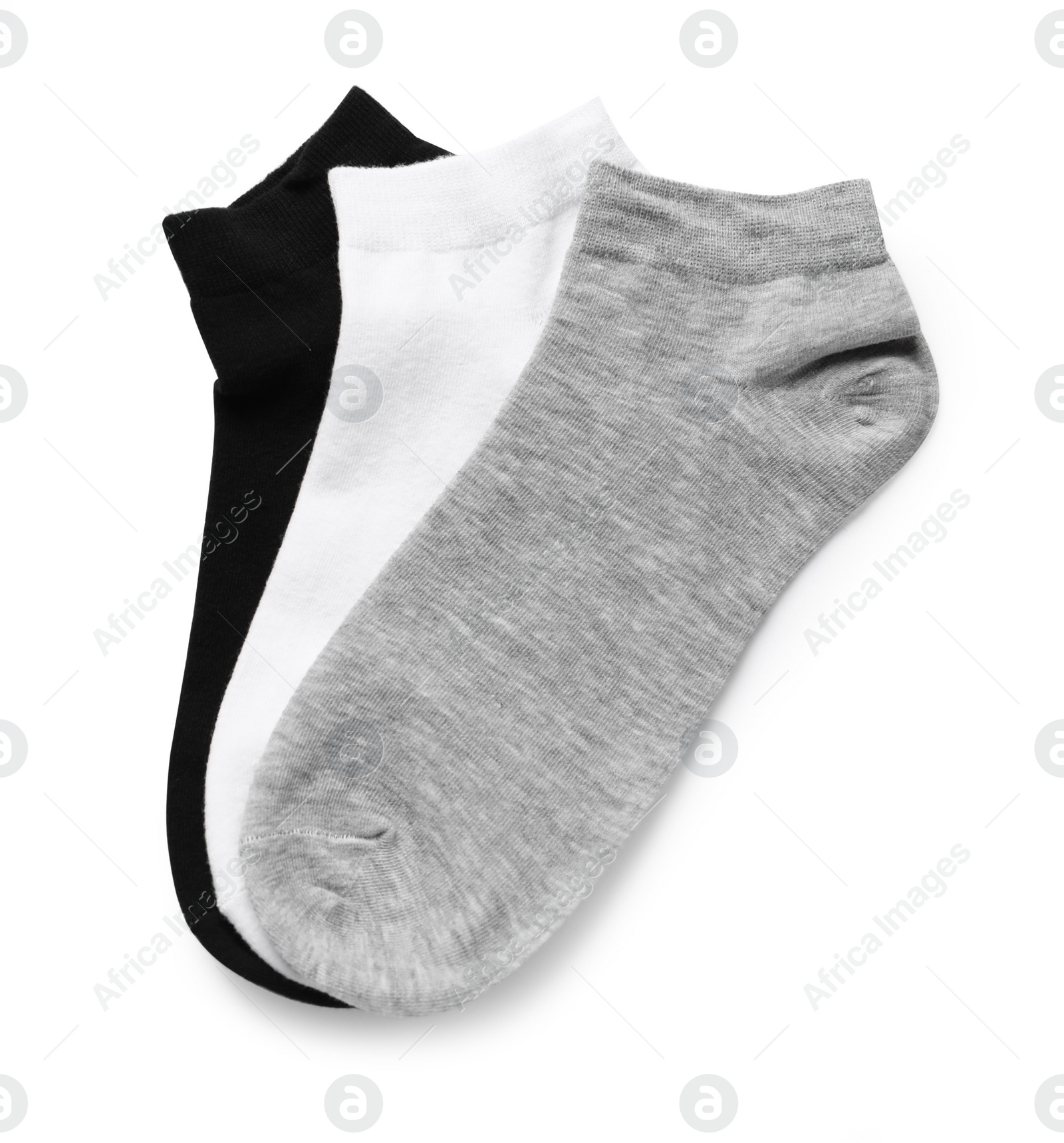 Photo of Different socks isolated on white, top view