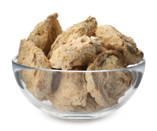 Photo of Dehydrated soy meat chunks in bowl on white background