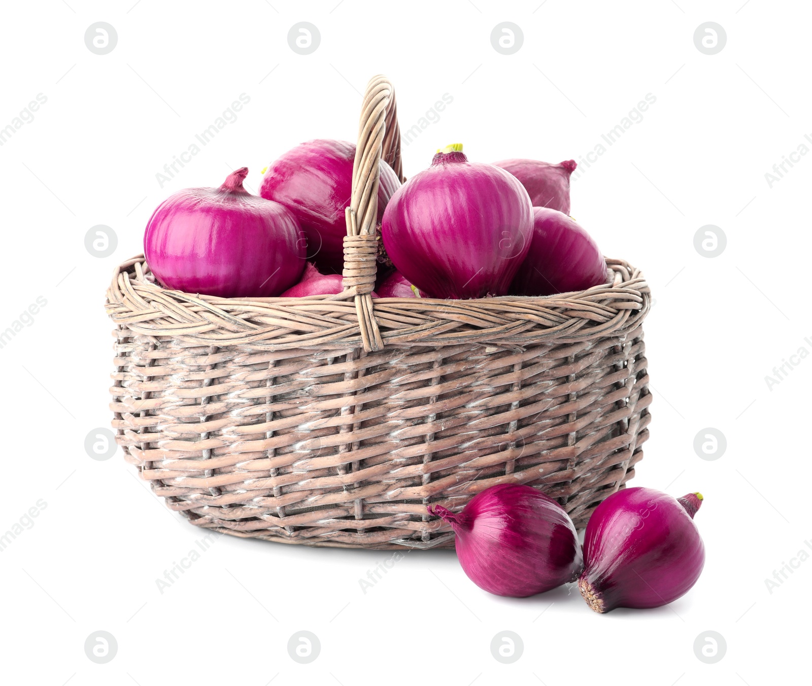 Photo of Basket full of onion bulbs isolated on white