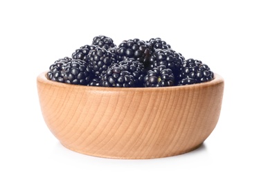 Photo of Bowl with ripe blackberries on white background