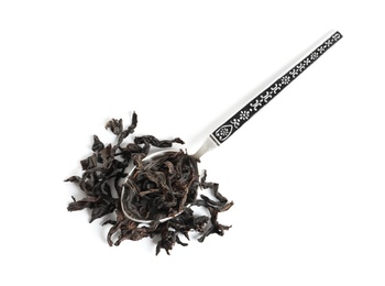 Photo of Spoon with Da Hong Pao Oolong tea on white background, top view