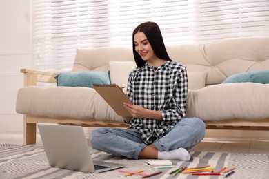 Happy woman drawing picture at online art lesson indoors. Distant learning