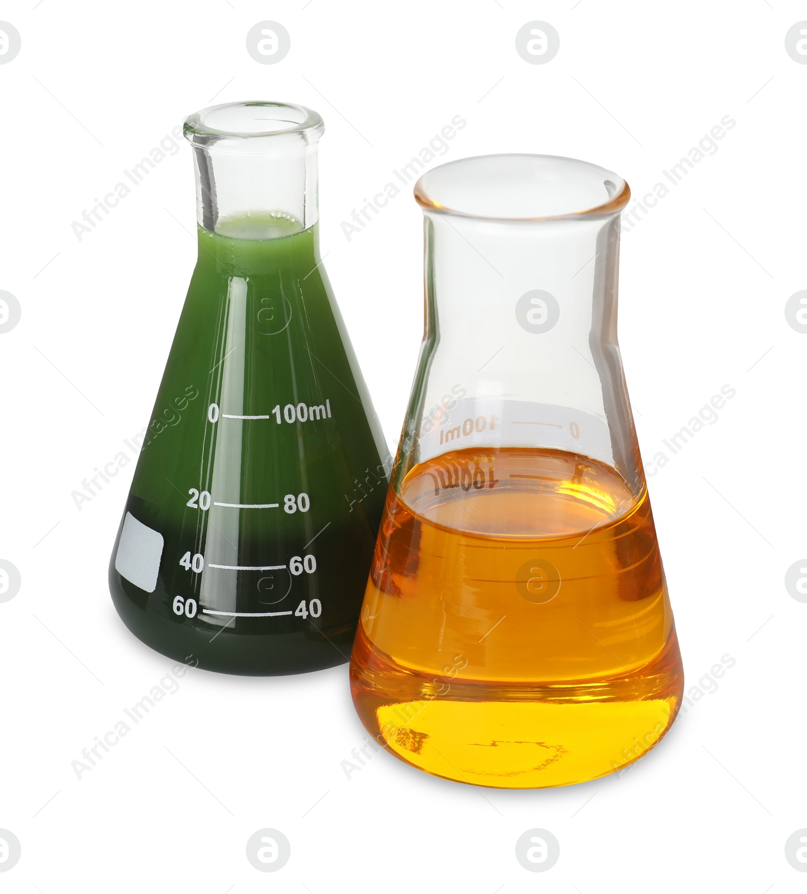 Photo of Two flasks with different types of crude oil isolated on white